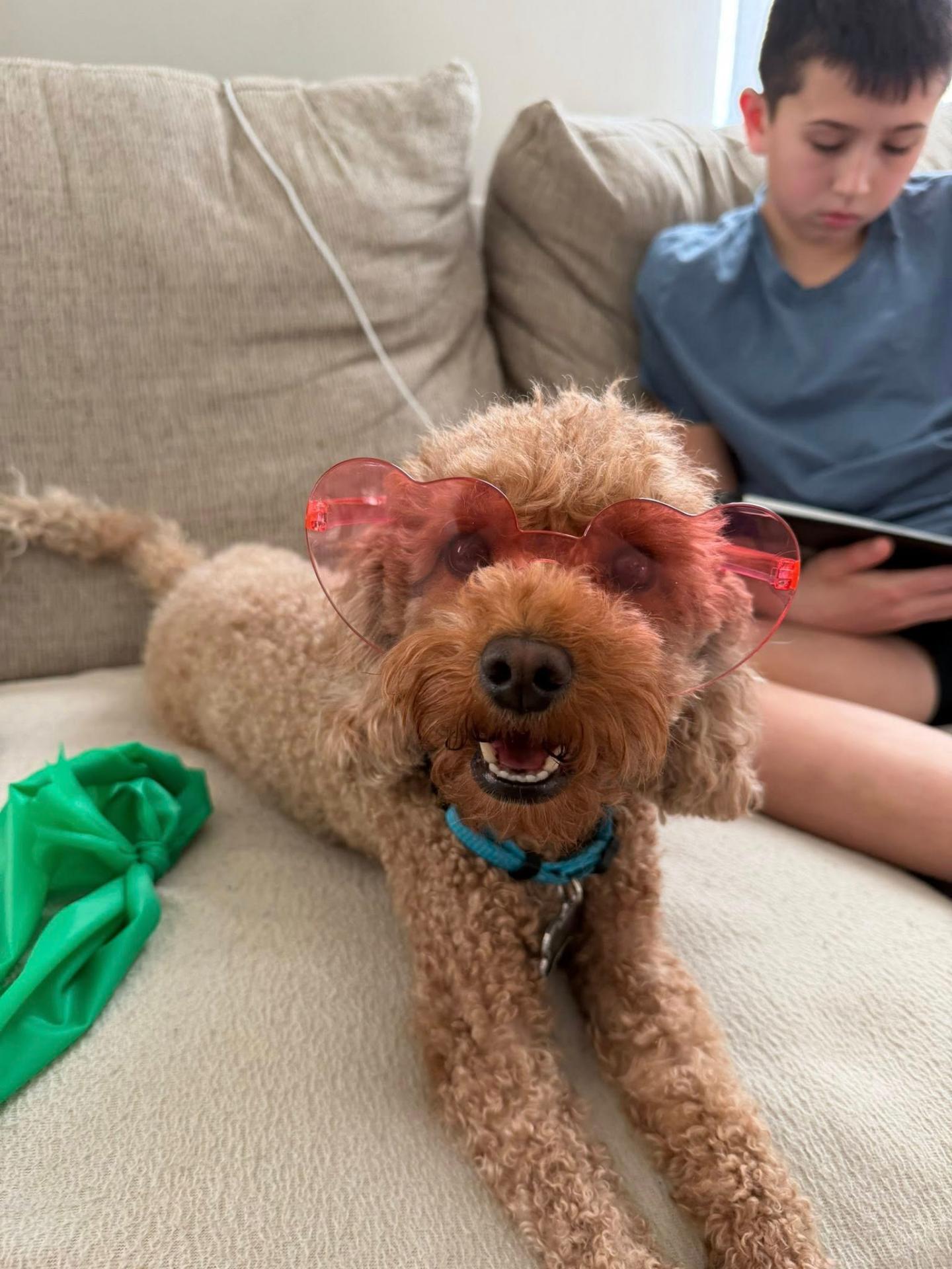 Maya wearing heart sunglasses